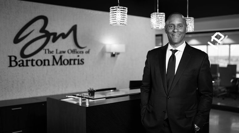barton morris lobby barton morris posing infront of lobby desk